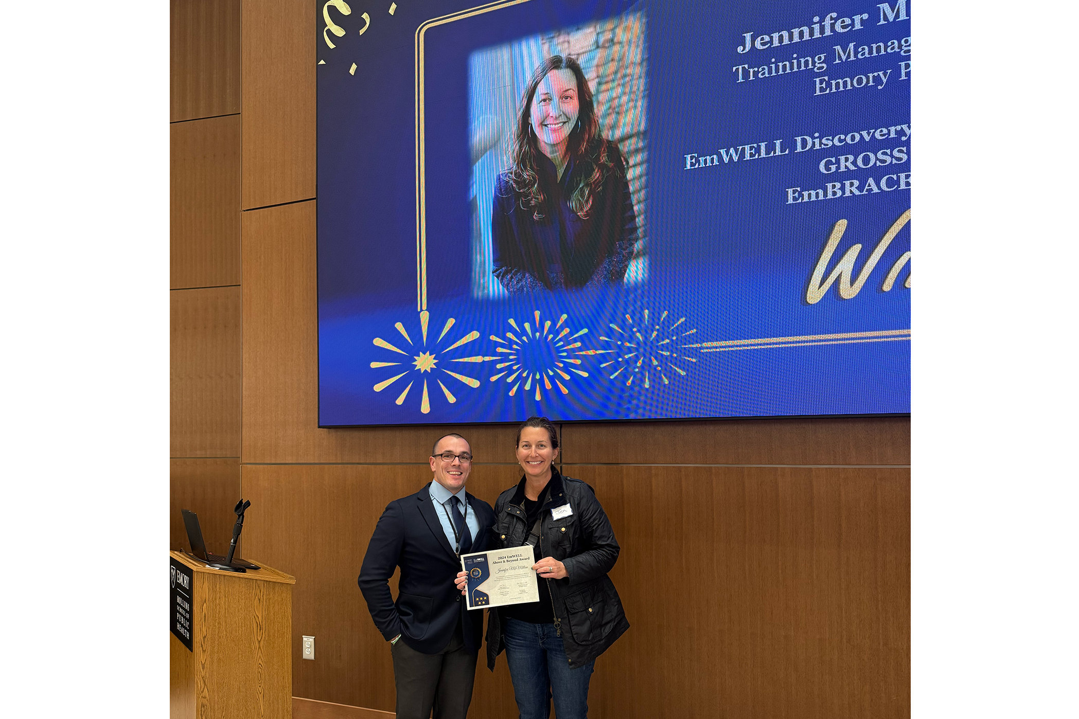 Jen McMillan accepts her award